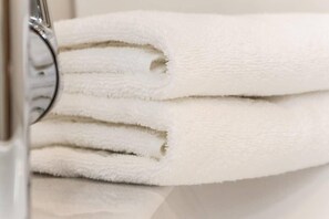 Apartment, 2 Bedrooms | Bathroom amenities | Shower, rainfall showerhead, heated floors, towels