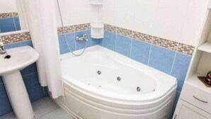 A bathroom with a bathtub, a sink, and a cabinet. - Playa Azul , Luxury Penthouse With Spectacular Roof Terrace (Mogan)