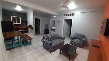 Family Suite, 2 Bedrooms | Living area | 32-inch flat-screen TV with digital channels, TV