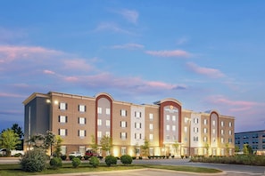 A multi-story hotel with a symmetrical facade, multiple windows, and a central entrance. - Candlewood Suites Lebanon by IHG (Lebanon)