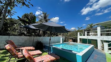 Outdoor pool, pool umbrellas, pool loungers