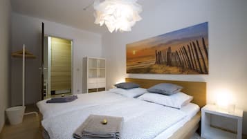 3 habitaciones, tabla de planchar con plancha, wifi y ropa de cama