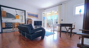 TV, fireplace, table football, books