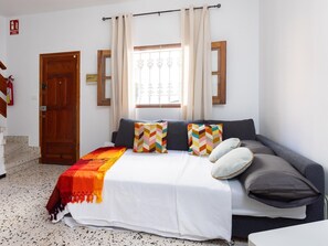 1 quarto, ferros/tábuas de passar roupa