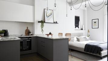 Contemporary Studio - minutes from Angel Tube St. (Apt 1) | Living area | 42-inch LED TV with digital channels, TV, Netflix