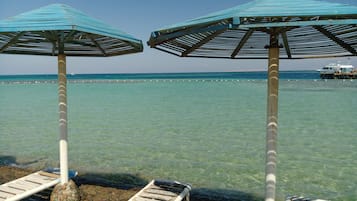 Private beach, sun loungers, beach umbrellas, beach towels