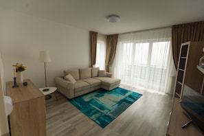 Comfort Apartment | Living area | Flat-screen TV - Apartment Ella (Brasov)