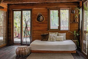 Designer Cabin (Shanti) | Premium bedding, down comforters, individually decorated - ANAND Ecoaldea (Leona Vicario)