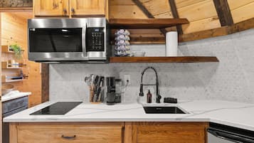 Microwave, stovetop, coffee/tea maker, toaster