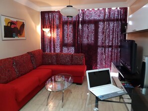 Apartamento, 1 quarto | Sala de estar