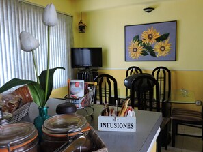 Fridge, microwave, electric kettle, cookware/dishes/utensils