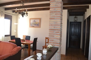 House, 2 Bedrooms, Smoking, Balcony | Dining - Cozy Rural Tourism Accommodation in Huetor Spain (Vinuela)