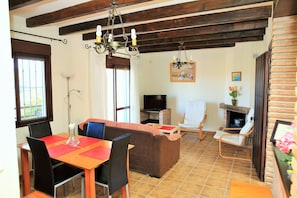 House, 2 Bedrooms, Smoking, Balcony | Dining - Cozy Rural Tourism Accommodation in Huetor Spain (Vinuela)