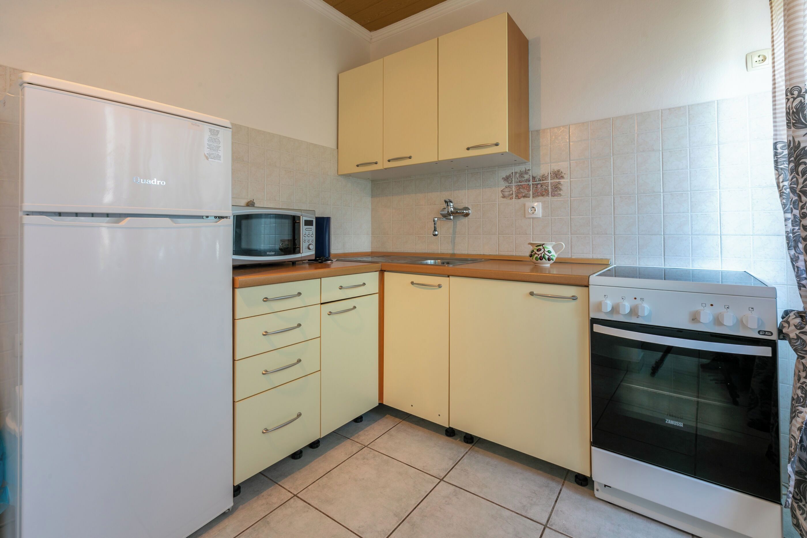 Apartment (A1) | Private kitchen | Fridge, microwave, stovetop, espresso maker