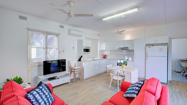 A modern apartment with a living room, kitchen, and dining area. - Ruby is the precious jewel in the heart of Exmouth. (Exmouth)