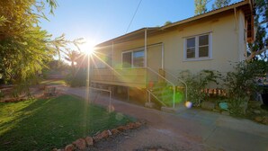A single-story house with a covered porch and a small staircase leading to the front door. - Ruby is the precious jewel in the heart of Exmouth. (Exmouth)