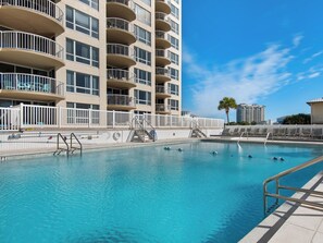 Relax by the pool surrounded by balconies with stunning views.