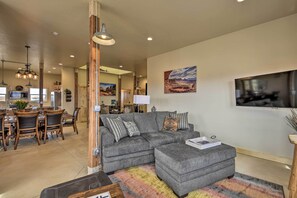 TV, fireplace, books