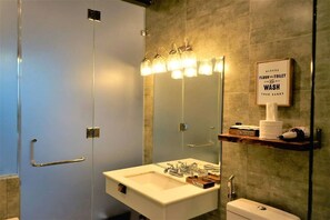 Bathtub, hair dryer, towels, soap