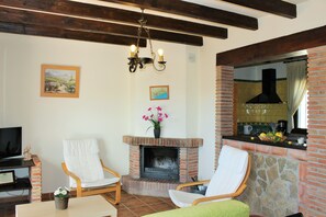 House, 2 Bedrooms, Smoking, Balcony | Living room | Flat-screen TV