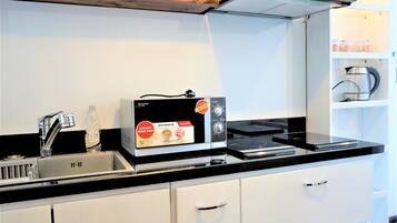 Fridge, microwave, coffee/tea maker, electric kettle