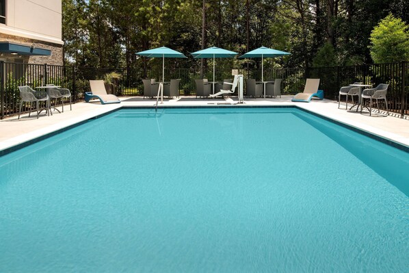 Outdoor pool, open 9:00 AM to 10:00 PM, pool umbrellas, pool loungers