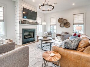 Smart TV, fireplace, DVD player, books