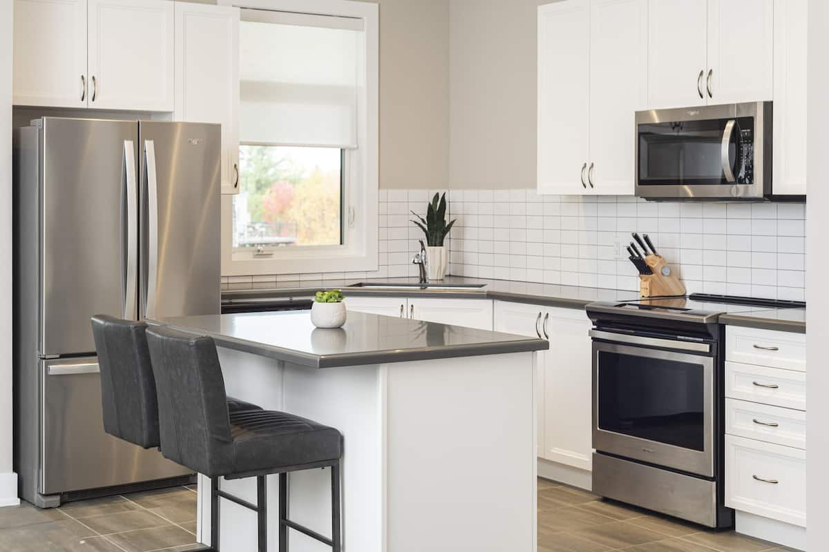 villa, 3 bedrooms | private kitchen | full-sized fridge, microwave, oven, stovetop