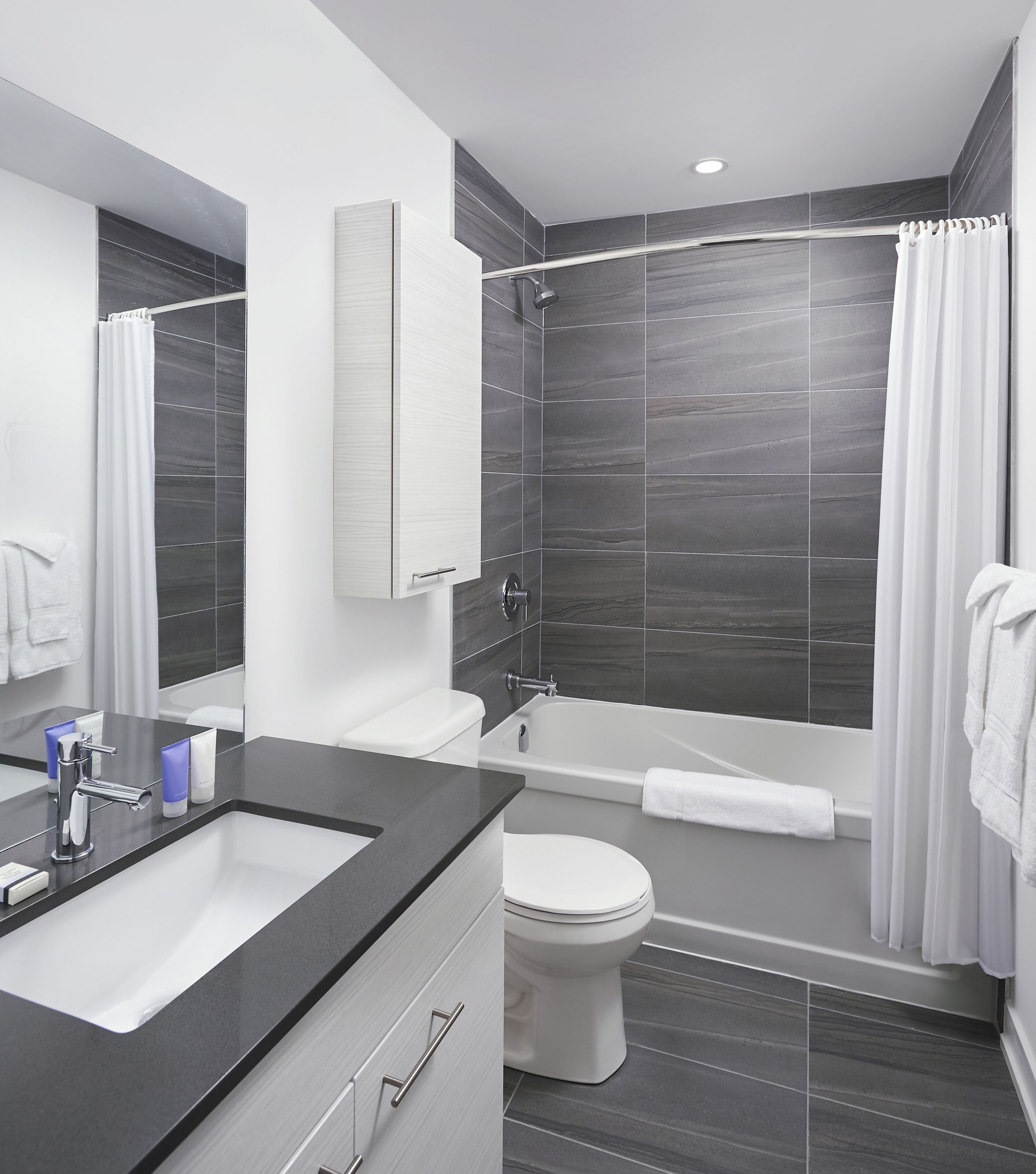 eco-friendly toiletries, hair dryer, towels, soap