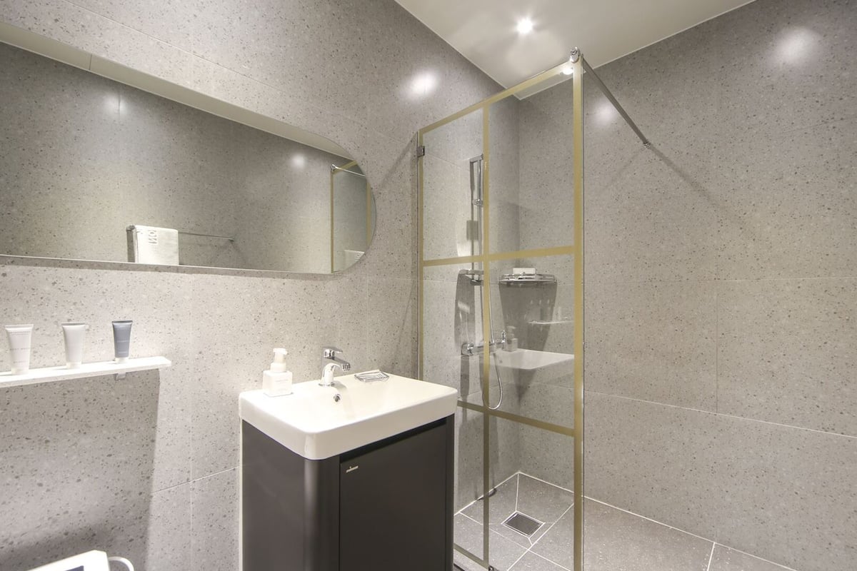 shower, designer toiletries, hair dryer, bathrobes