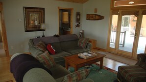 Comfort Cabin | Living room | 32-inch LCD TV with cable channels, TV, fireplace - Apostle Pines 4 by Winfield Inn (Bayfield)
