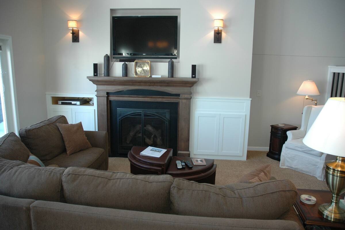 Condo 301 By Winfield Inn | Living room | 40-inch LCD TV with digital channels, TV, fireplace