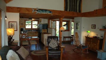 Comfort Cabin | Living area | 32-inch LCD TV with cable channels, TV, fireplace