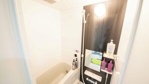 Designer's Apartment - Pet Friendly (Additional Fee) | Bathroom | Combined shower/tub, designer toiletries, hair dryer, slippers - Polaris 102 (Nagoya)