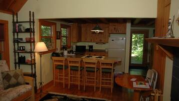 Comfort Cabin | Living area | 32-inch LCD TV with cable channels, TV, fireplace