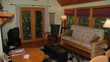 Comfort Cabin | Living area | 32-inch LCD TV with cable channels, TV, fireplace