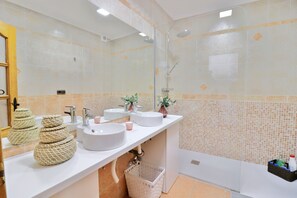 Bathtub, hair dryer, towels