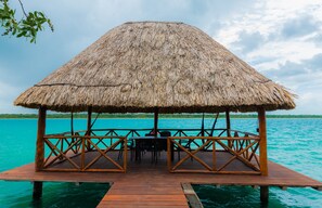 Outdoor dining - Cabin located on the shore of the Laguna de los Siete Colores (Pedro Antonio Santos)
