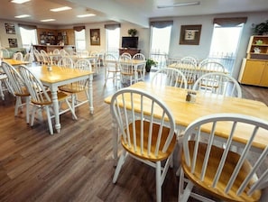 Enjoy a casual dining experience in this inviting space with comfortable seating and a warm atmosphere.