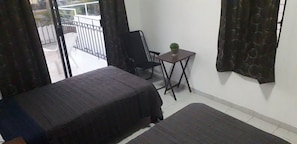 Basic Room | 1 bedroom, minibar, free WiFi - Triton - Rooms in Front of the Beach (Cancun)