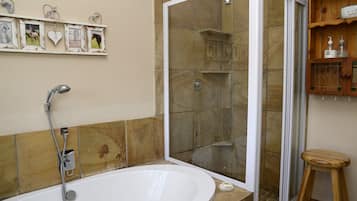 Luxury Triple Room, 1 Bedroom, Non Smoking, Pool View (Geelhout) | Bathroom | Rainfall showerhead, towels, soap, toilet paper