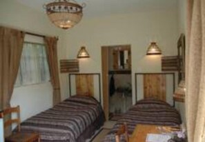 Individually decorated, individually furnished, iron/ironing board - Marnicus Guesthouse (Matjhabeng)