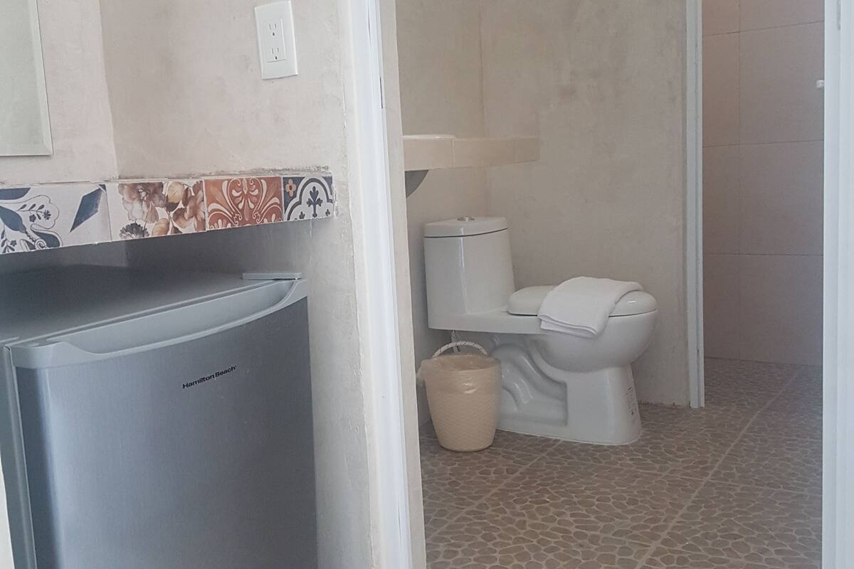 deluxe room, 1 king bed | minibar, individually decorated, individually furnished