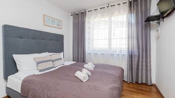 1 chambre, fer et planche Ă repasser, Wi-Fi, draps fournis