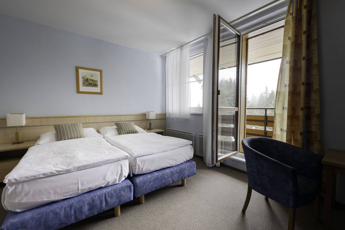 Appartement, patio | 2 slaapkamers, een laptopwerkplek, verduisterende gordijnen, babybedden
