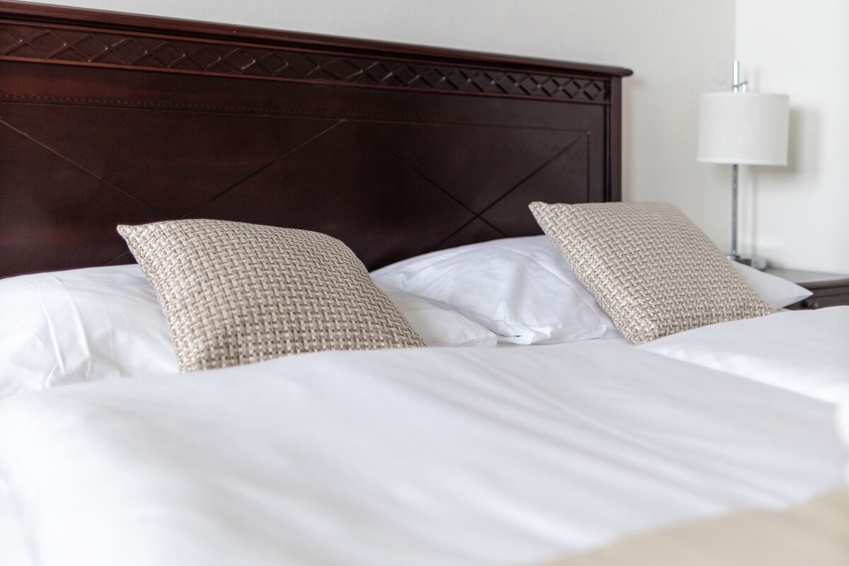 Laptop workspace, blackout curtains, free cots/infant beds, bed sheets