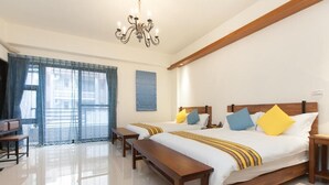 A hotel room with two beds, a bench, a desk, and a chandelier. - Professor's House 2198 (Ji'an)