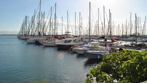 A marina with numerous sailboats docked. - Centro Storico via Sassari Accommodation (Cagliari)