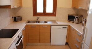 Apartment | Private kitchen | Full-size fridge, microwave, oven, stovetop