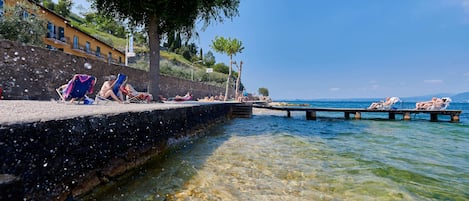 Beach nearby, white sand, sun-loungers